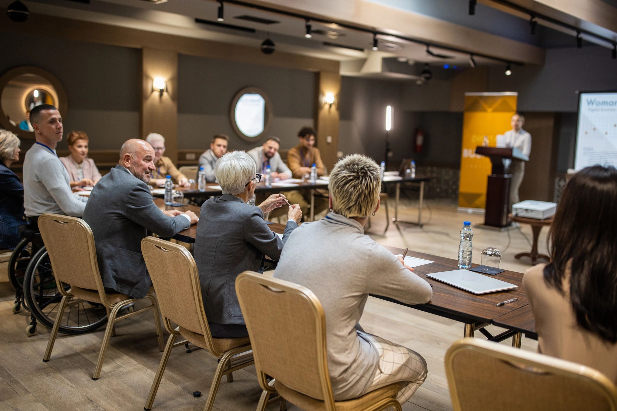 Business conference audience in a governance and leadership session