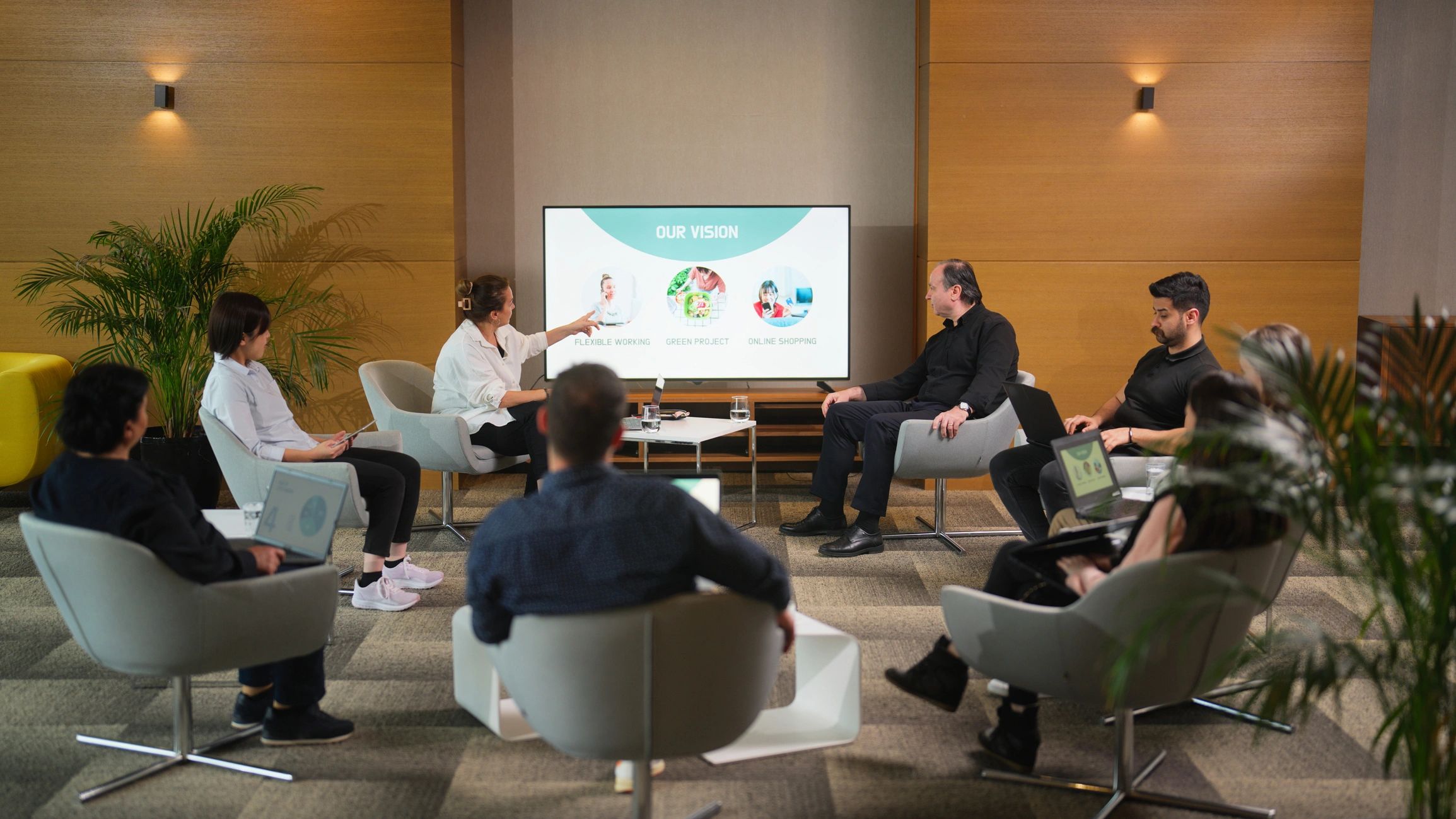 Consulting workshop with business team reviewing strategy