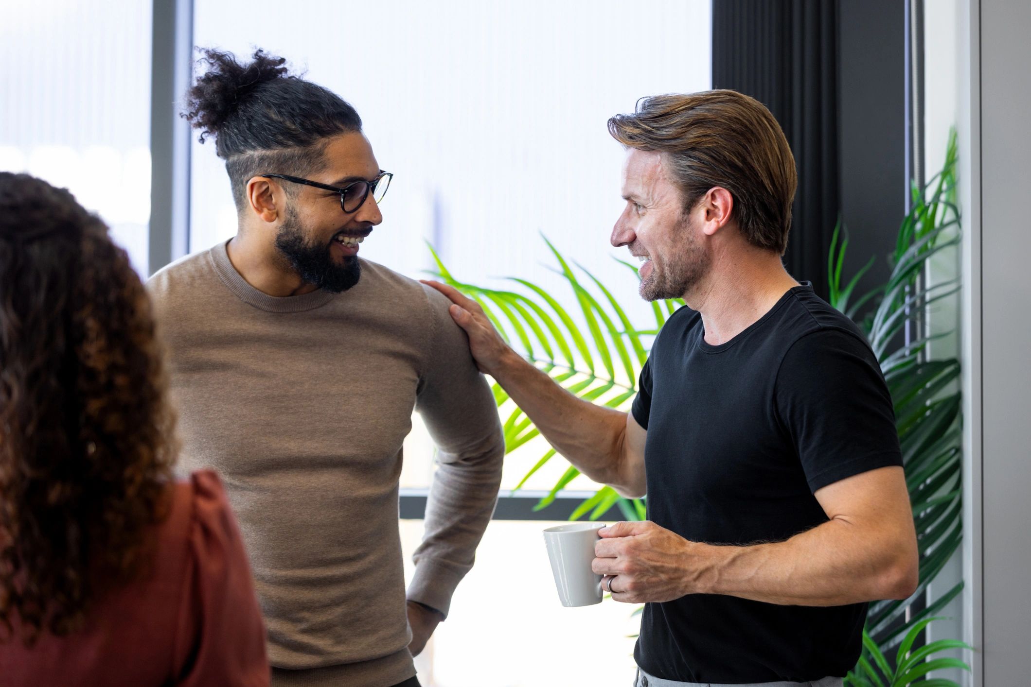 Business consultants in discussion during a professional office meeting
