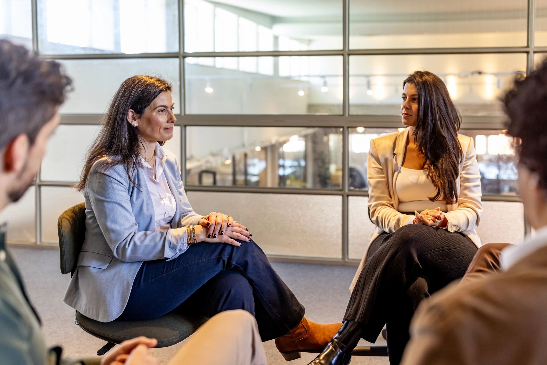 Consulting team collaborating in a modern office meeting